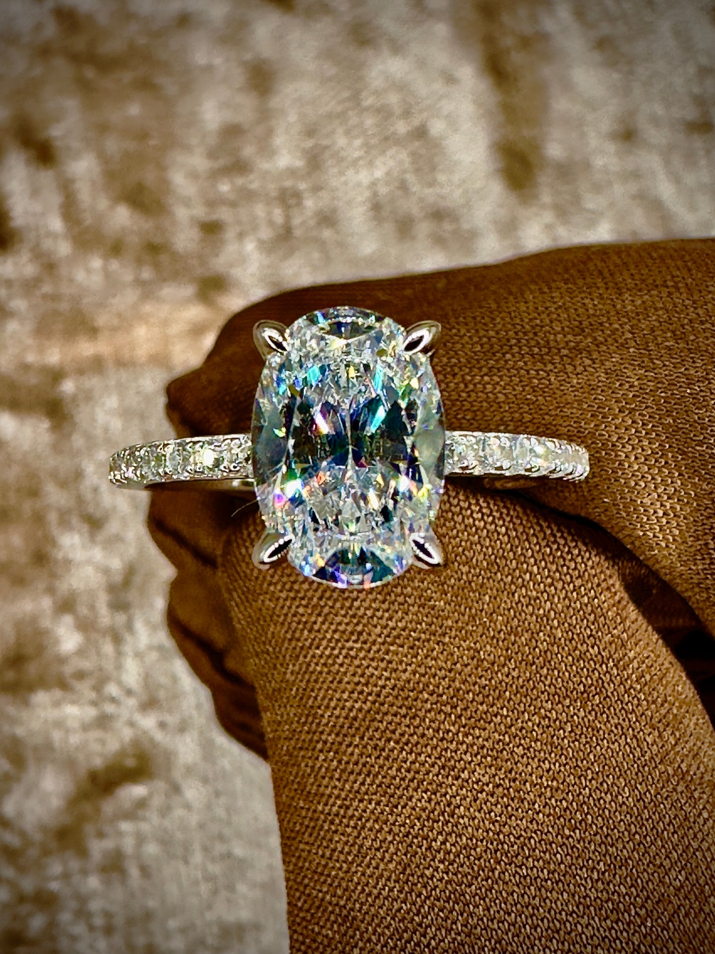 Oval Cut Cubic Zirconia Ring – 7x10mm Pave Band
