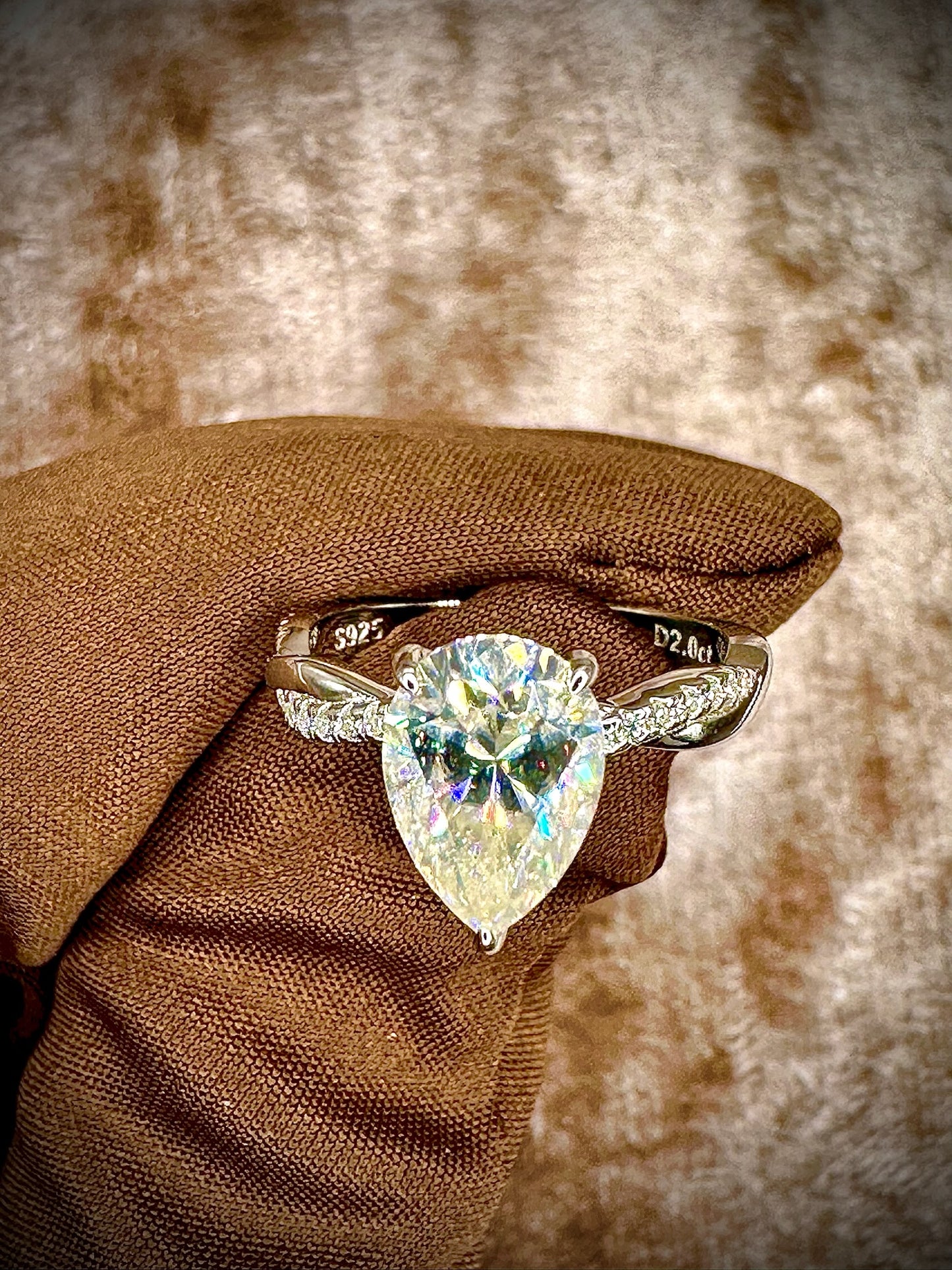Pear Cut Moissanite Ring – Twisted Band