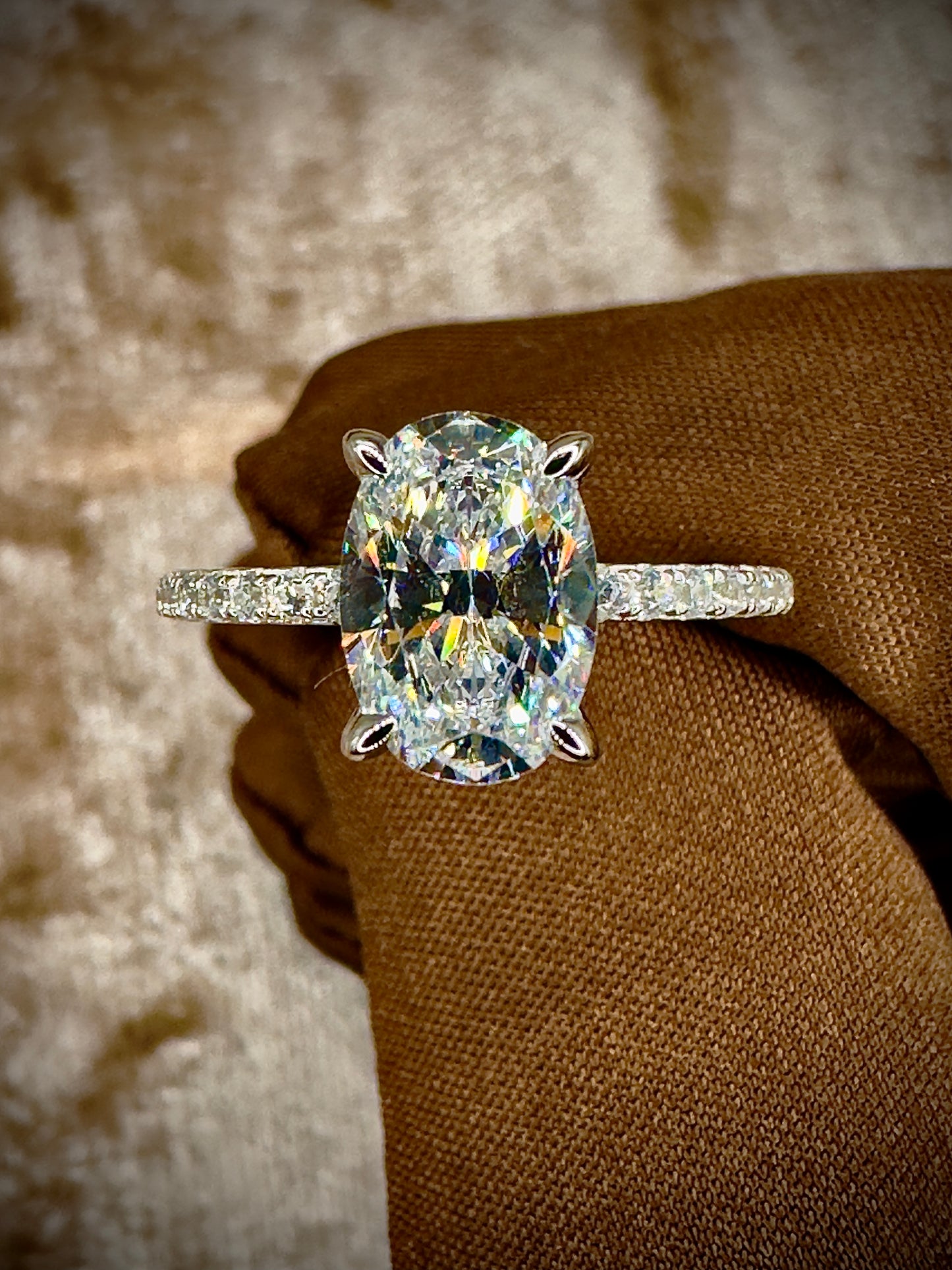 Oval Cut Cubic Zirconia Ring – 7x10mm Pave Band