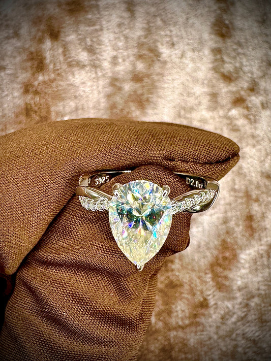 Pear Cut Moissanite Ring – Twisted Band